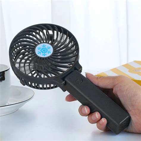 hand held fan for cooling.